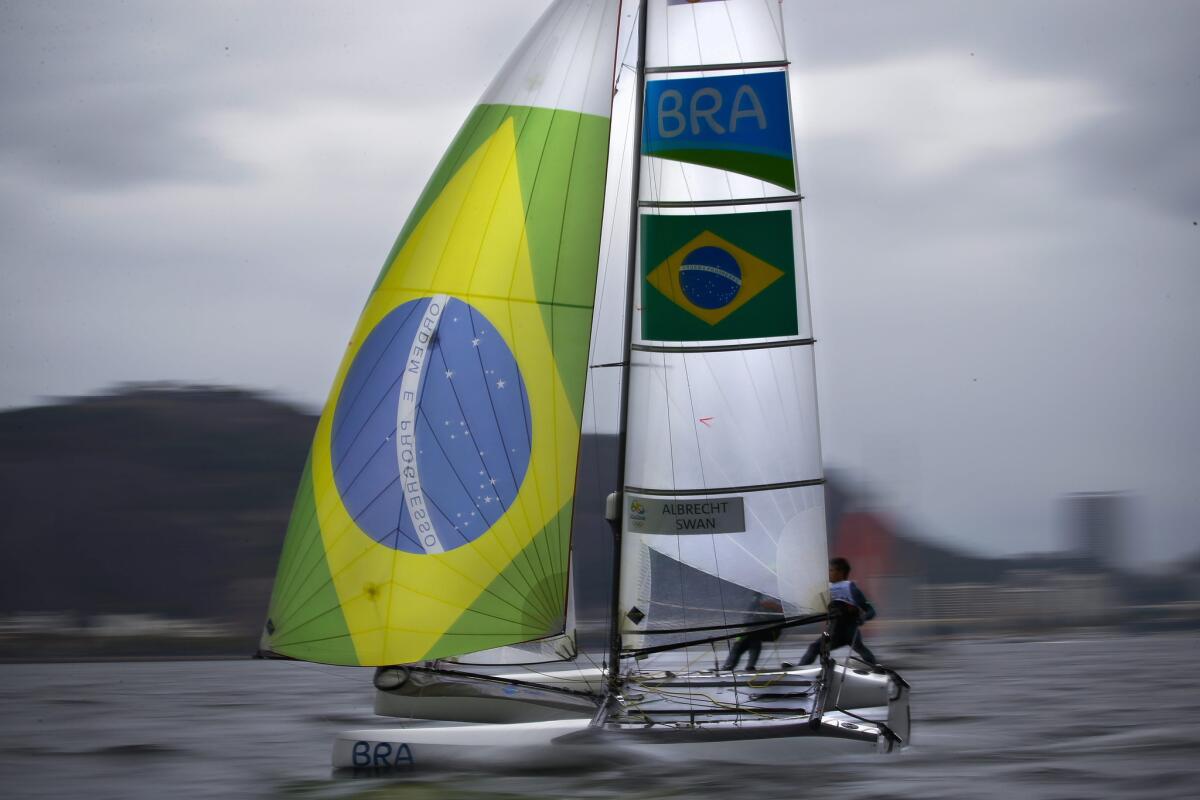 Samuel Albrecht and Isabel Swan from Brazil sail during the Nacra 17 mixed class race 01 in the Rio 2016 Olympic Games sailing events in Guanabara Bay on Aug. 10.