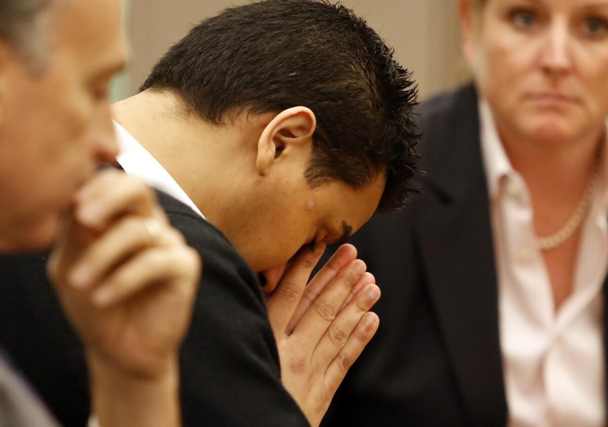 Iftekhar Murtaza bows his head in a courtroom at the Central Justice Center in Santa Ana on Dec 16, 2013, before the jury recommended that he be given the death penalty for killing his ex-girlfriend's father and sister and setting their Anaheim Hills home on fire. He was sentenced to death on Tuesday, March 3, 2015.