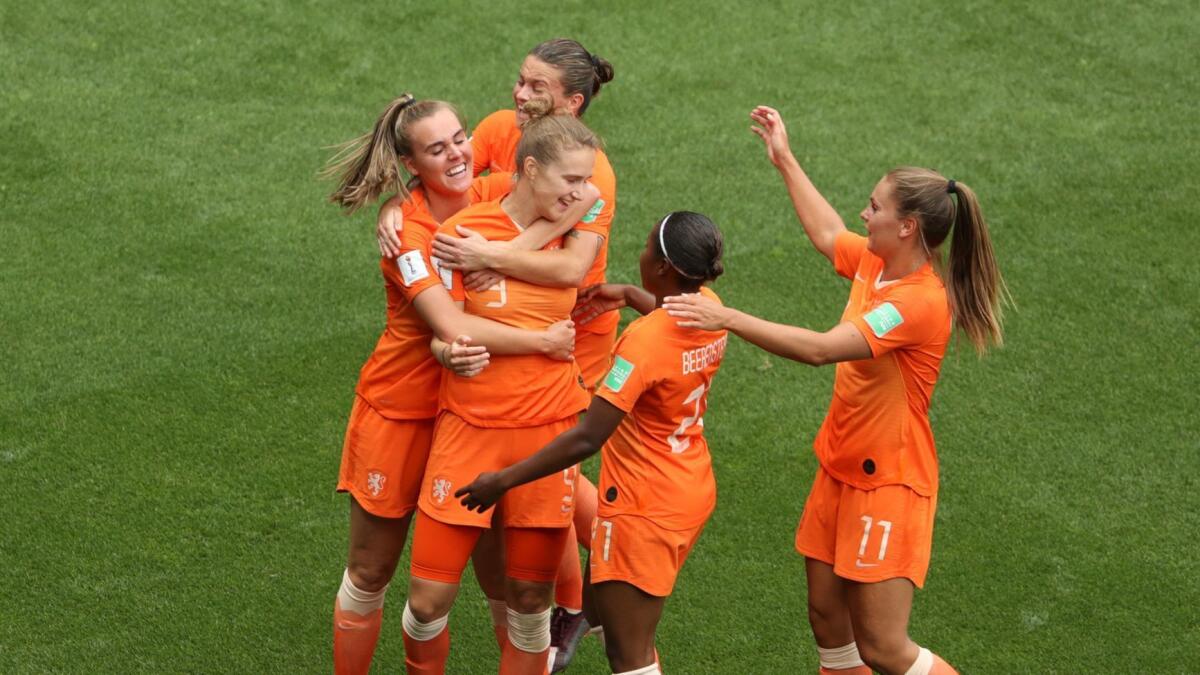 Netherlands players celebrate after scoring a third goal during their group play victory over Cameroon at the Women's World Cup on Saturday.