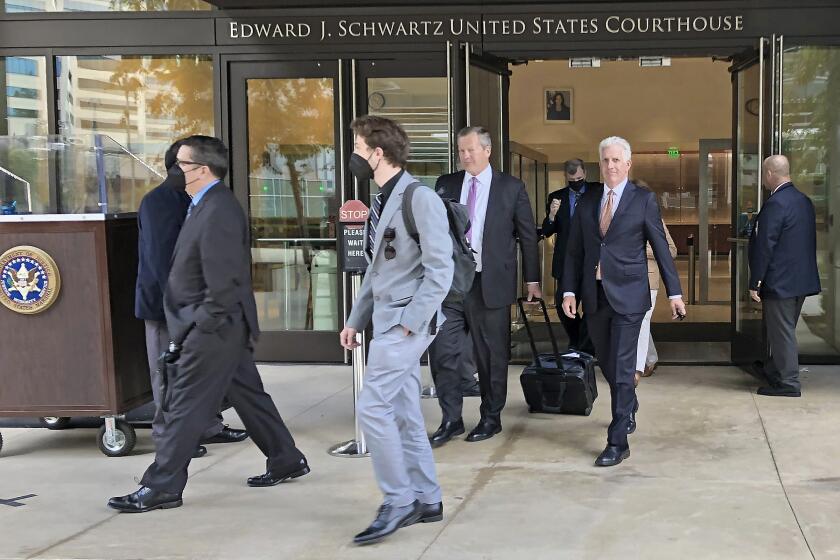 Seventh fleet defendants in the Fat Leonard trial leave court on Tuesday, April 26, 2022