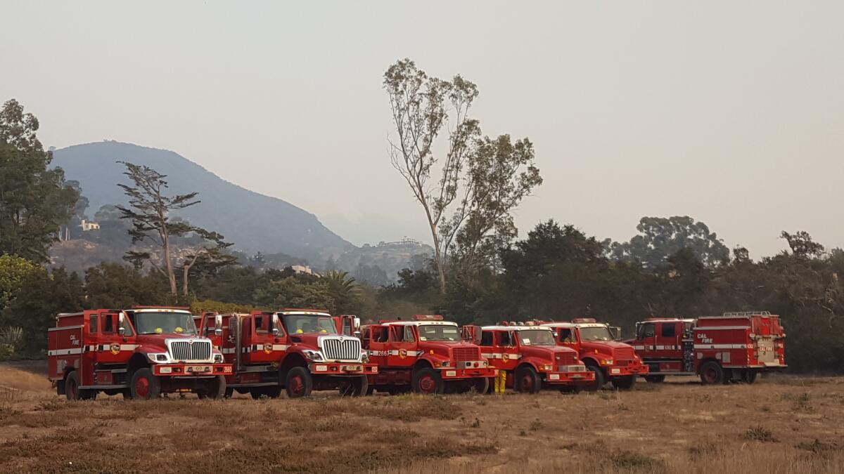 Firefighters set up in an open field in the Montecito evacuation zone.