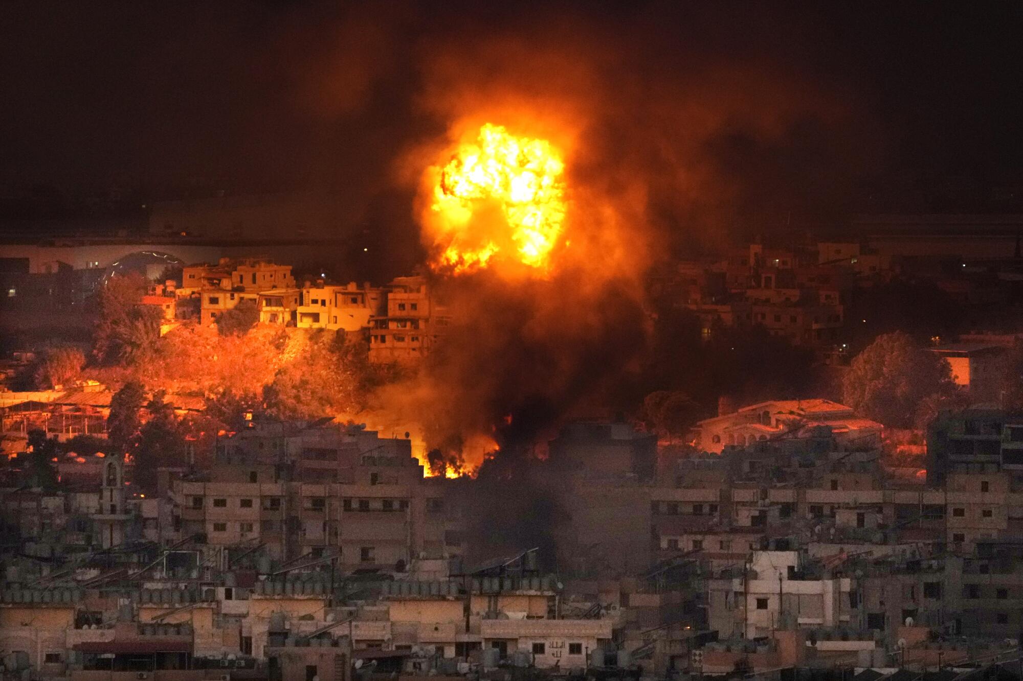 Flames rise after an Israeli airstrike 