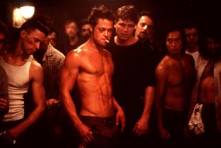 Brad Pitt, center, stars as Tyler Durden in the 20th Century Fox presentation of "Fight Club," 1999.