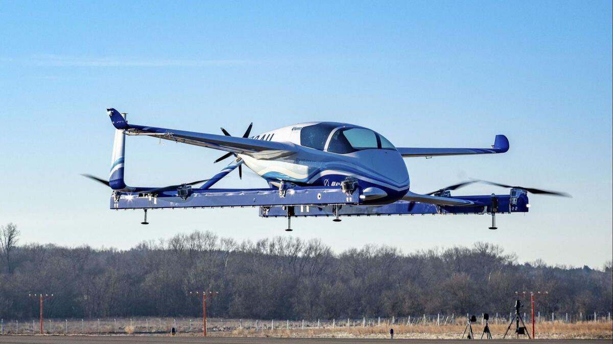 This January 22, 2019 handout photo obtained January 23, 2019 courtesy of Boeing, shows a prototype "flying car" -- part of a project aimed at "on-demand autonomous air transportation". - Boeing said Wednesday its prototype "flying car" -- part of a project aimed at "on-demand autonomous air transportation" -- has completed its first successful test flight. The electric vertical takeoff and landing (eVTOL) aircraft said the test was carried out Tuesday outside the US capital Washington, the company said in a statement.Boeing is among a handful of companies in the United States and around the world -- including Uber and a startup backed by Google founder Larry Page -- that are developing vehicles which could be used for personal air transport with autonomous navigation. (Photo by HO / BOEING / AFP) / RESTRICTED TO EDITORIAL USE - MANDATORY CREDIT "AFP PHOTO / BOEING/HANDOUT" - NO MARKETING NO ADVERTISING CAMPAIGNS - DISTRIBUTED AS A SERVICE TO CLIENTSHO/AFP/Getty Images ** OUTS - ELSENT, FPG, CM - OUTS * NM, PH, VA if sourced by CT, LA or MoD **