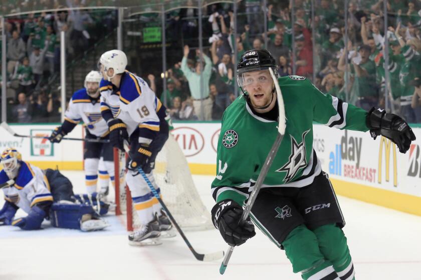 Stars forward Radek Faksa celebrates after scoring a goal on Blues goalie Brian Elliott during the third period of a game on April 29.