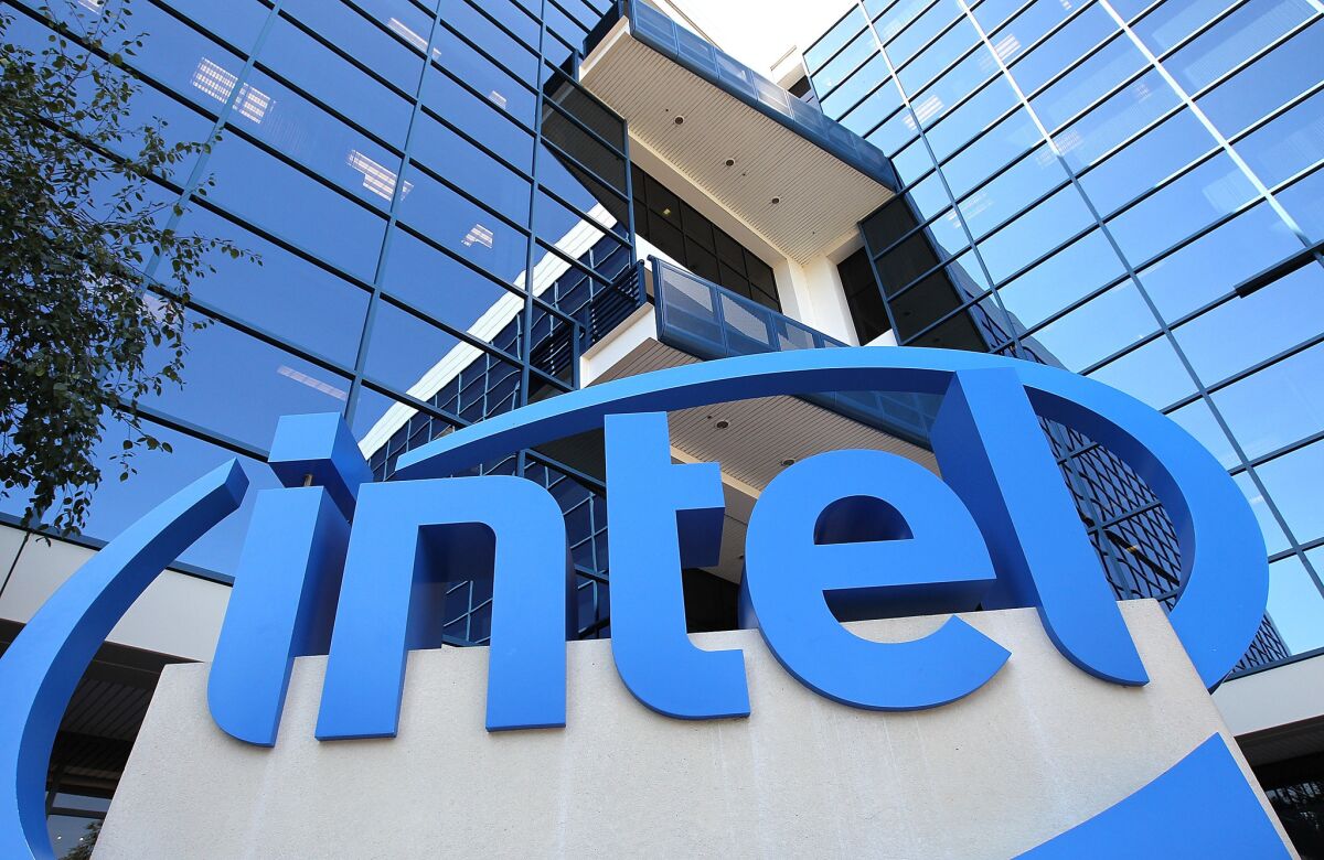 A sign with Intel's logo stands at company headquarters in Santa Clara.
