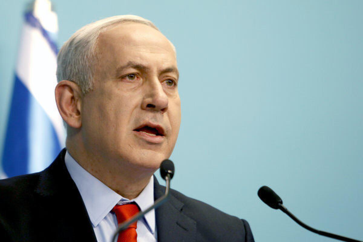 Israeli Prime Minister Benjamin Netanyahu delivers a statement at his Jerusalem office in July. In the wake of a beating attack on a Palestinian, he warned that Israel will not tolerate racism.