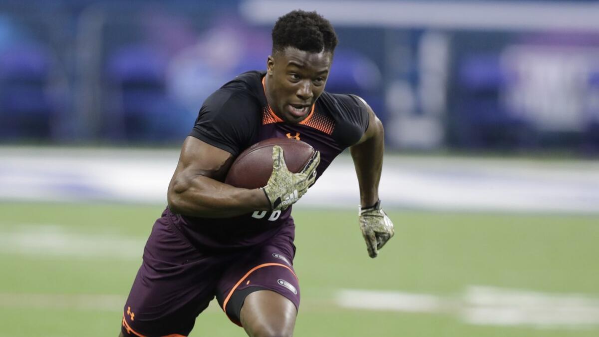 Washburn defensive back Corey Ballentine runs a drill at the NFL scouting combine in March.