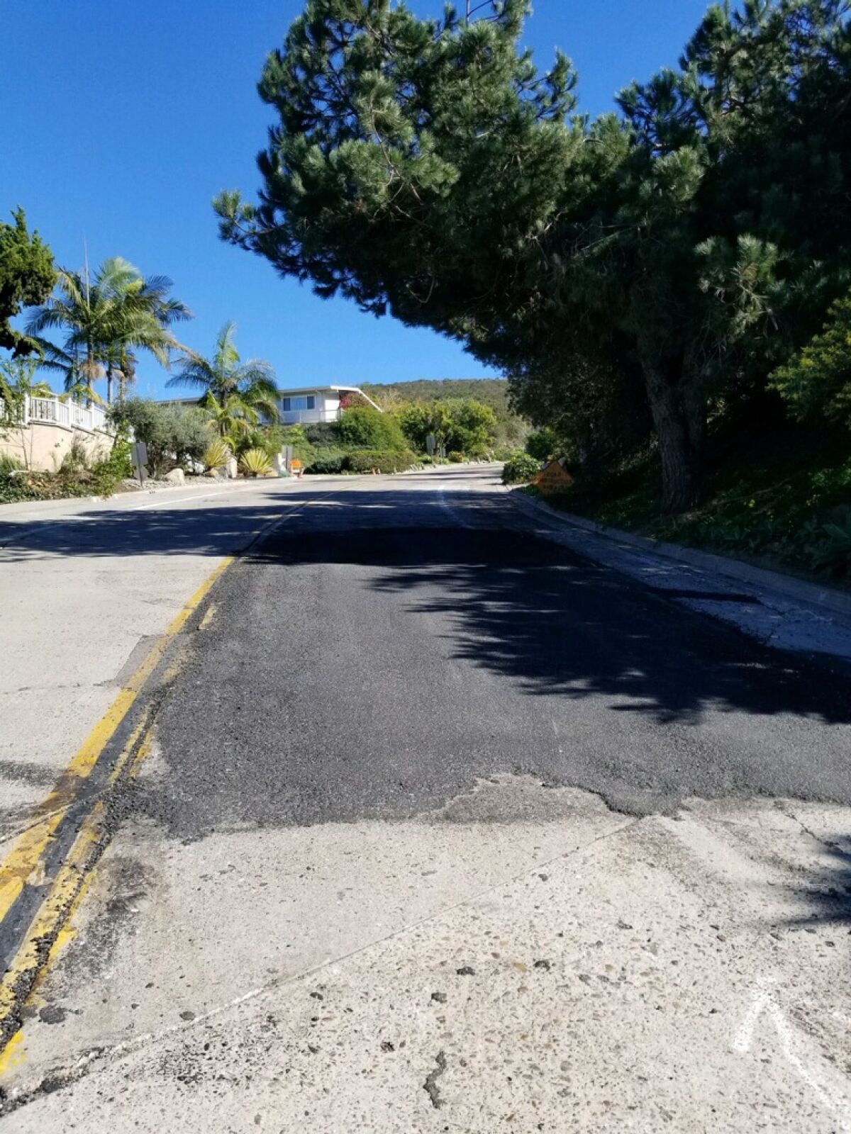Via Capri at Rue Denise received a temporary asphalt patch after the concrete portion was deemed dangerous for driving.