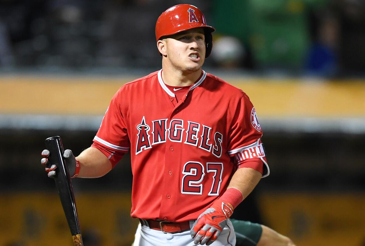 Angels outfielder Mike Trout reacts after striking out against the Athletics during the top of the eighth inning on April 12.