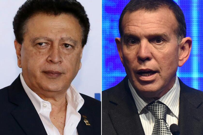 CONCACAF President Alfredo Hawit, left, and CONMEBOL President Juan Angel Napout were arrested Thursday in downtown Zurich, Switzerland.