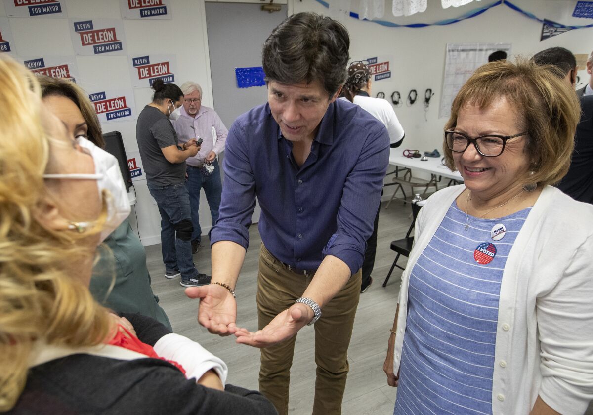 Then-mayoral candidate Kevin de León with María Elena Durazo at his campaign headquarters in Los Angeles in 2022.