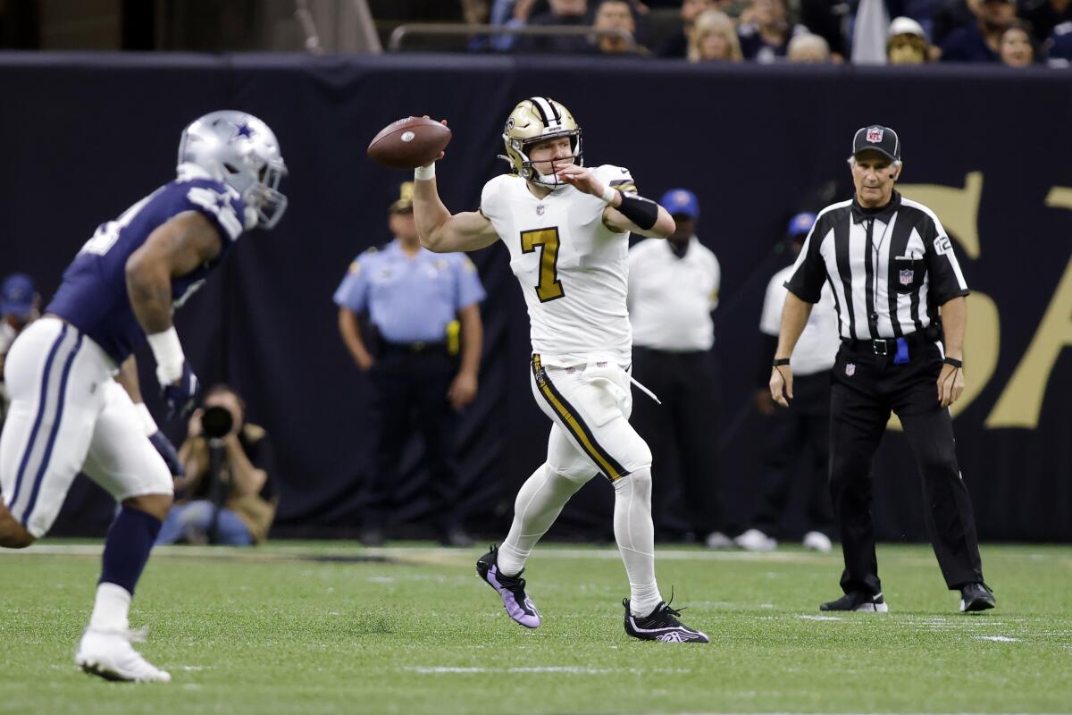 New Orleans Saints quarterback Taysom Hill throws against the Dallas Cowboys on Dec. 2.
