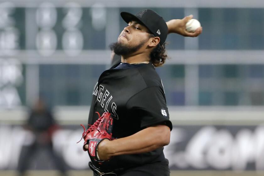 Los Angeles Angels starting pitcher Jaime Barria throws against the Houston Astros during the first inning of a baseball game Sunday, Aug. 25, 2019, in Houston. (AP Photo/Michael Wyke)