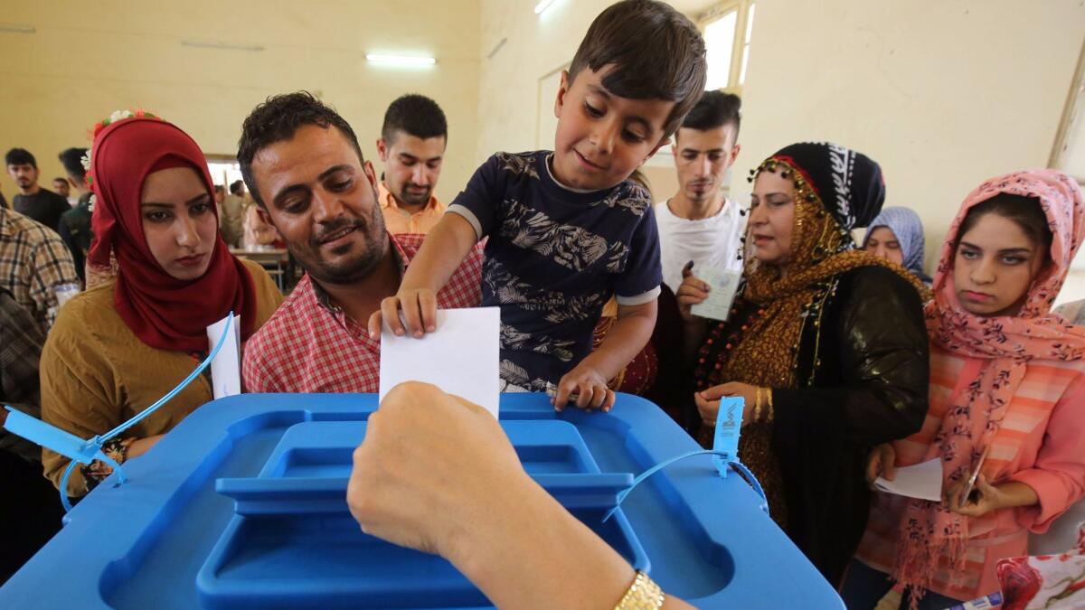 Iraqi Kurds casts their votes in the Kurdish independence referendum in the city of Kirkuk in northern Iraq, on Sept. 25, 2017.
