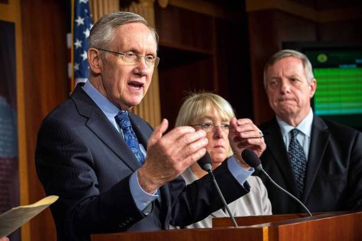 Senate Majority Leader Harry Reid, left, with Sens. Patty Murray (D-Wash.) and Richard J. Durbin (D-Ill.), met with Senate Minority Leader Mitch McConnell on Saturday to discuss the government standoff.