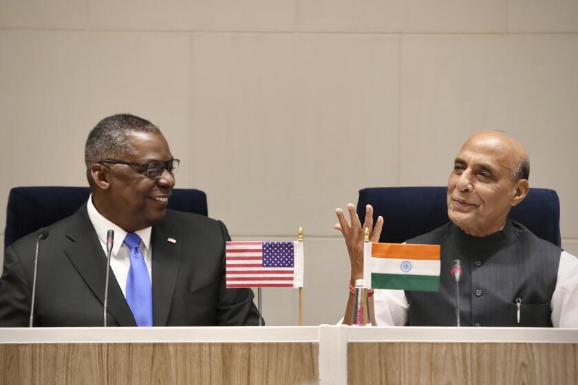 U.S. Secretary of Defense Lloyd Austin and Indian Defense Minister Rajnath Singh address the media in New Delhi on Saturday.