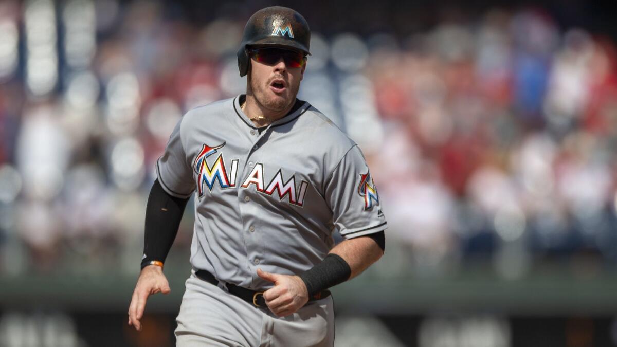 Justin Bour, shown with the Miami Marlins, has agreed to a one-year deal with the Angels..