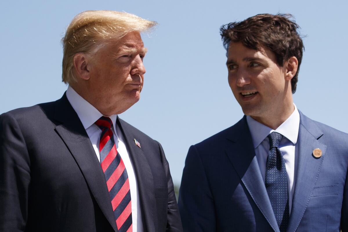 President Trump and Canadian Prime Minister Justin Trudeau speak in June.