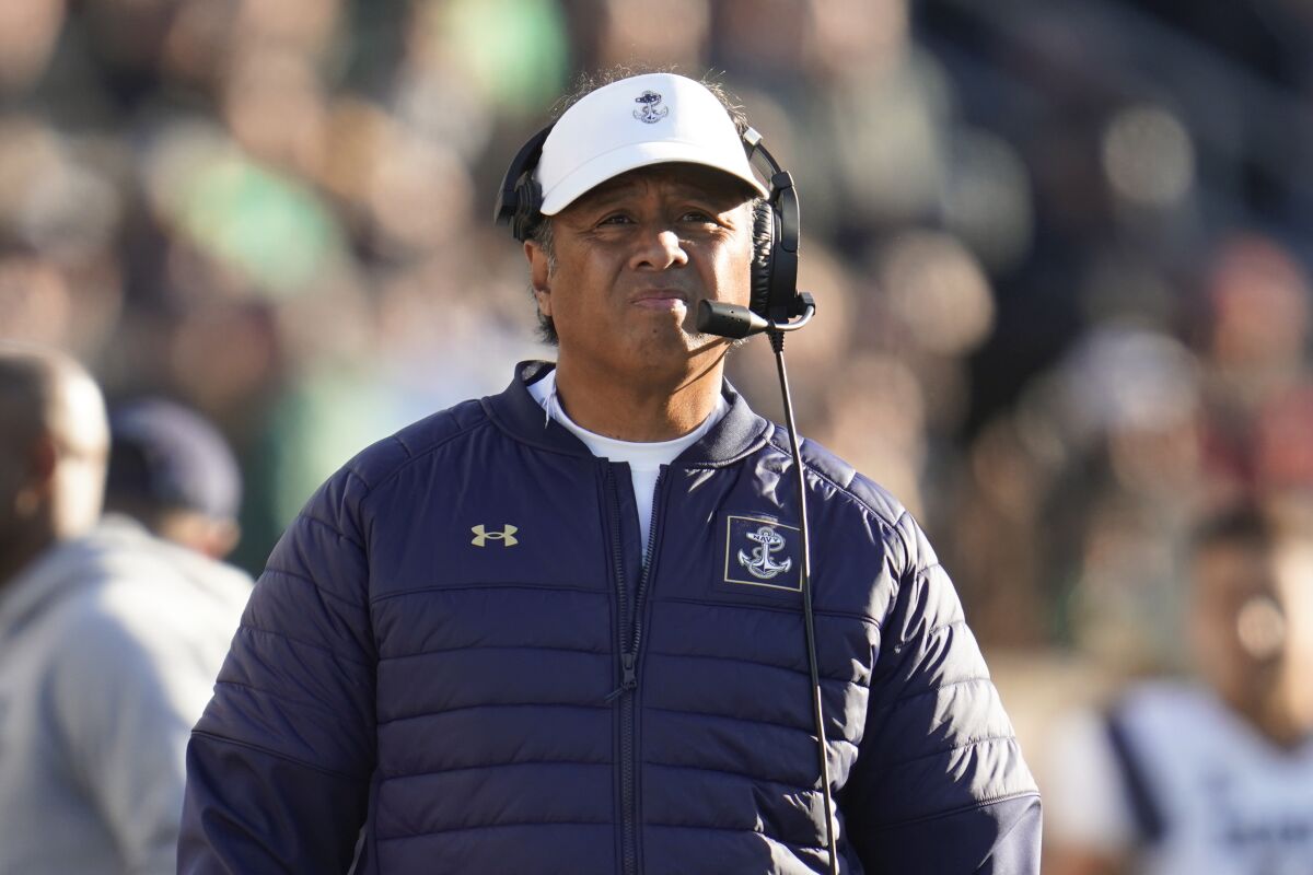 FILE - Navy head coach Ken Niumatalolo watches against Notre Dame in the first half of an NCAA college football game in South Bend, Ind., Nov. 6, 2021. No team's schedule has more bowl-bound opponents this season than Navy's, and that's part of the reason the Midshipmen are 3-8. The question now is whether that difficult schedule has prepared Navy for its biggest game of all — the annual clash with Army. (AP Photo/Paul Sancya, file)