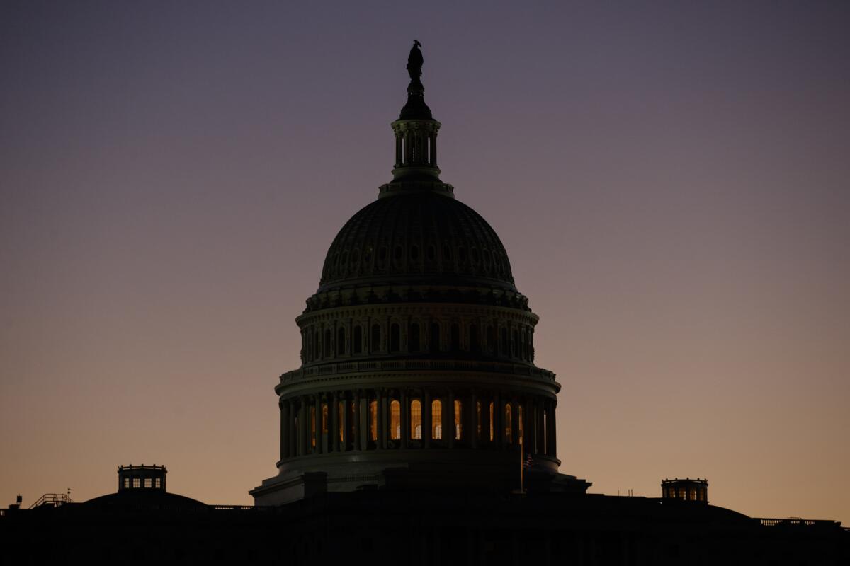 The U.S. Capitol Building Dome is seen before the sun rises in Washington, D.C.