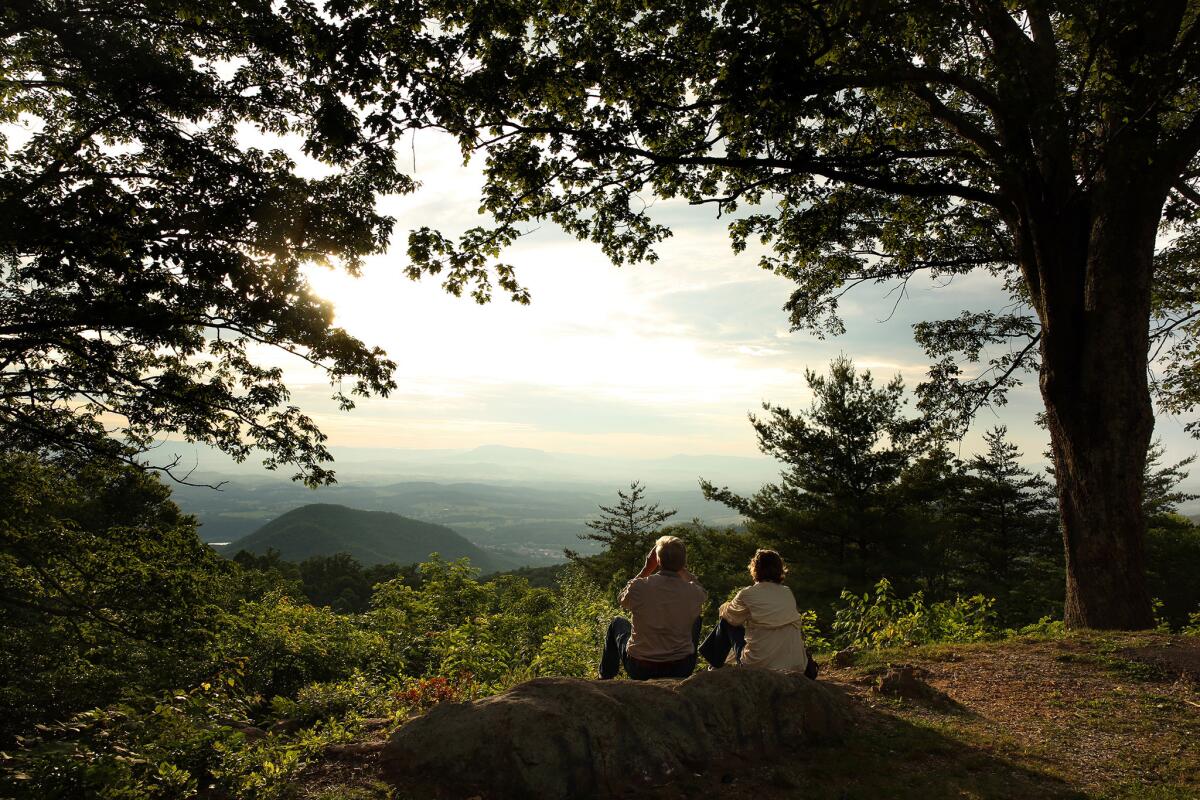 Robert Gorman and Carolyn Portier-Gorman of Thibodaux, La., admire the view from the Blue Ridge Parkway outside Roanoke, Va.