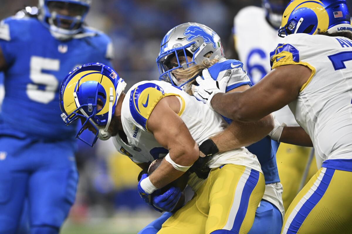 Detroit Lions linebacker Alex Anzalone sacks Rams quarterback Matthew Stafford during the first half.