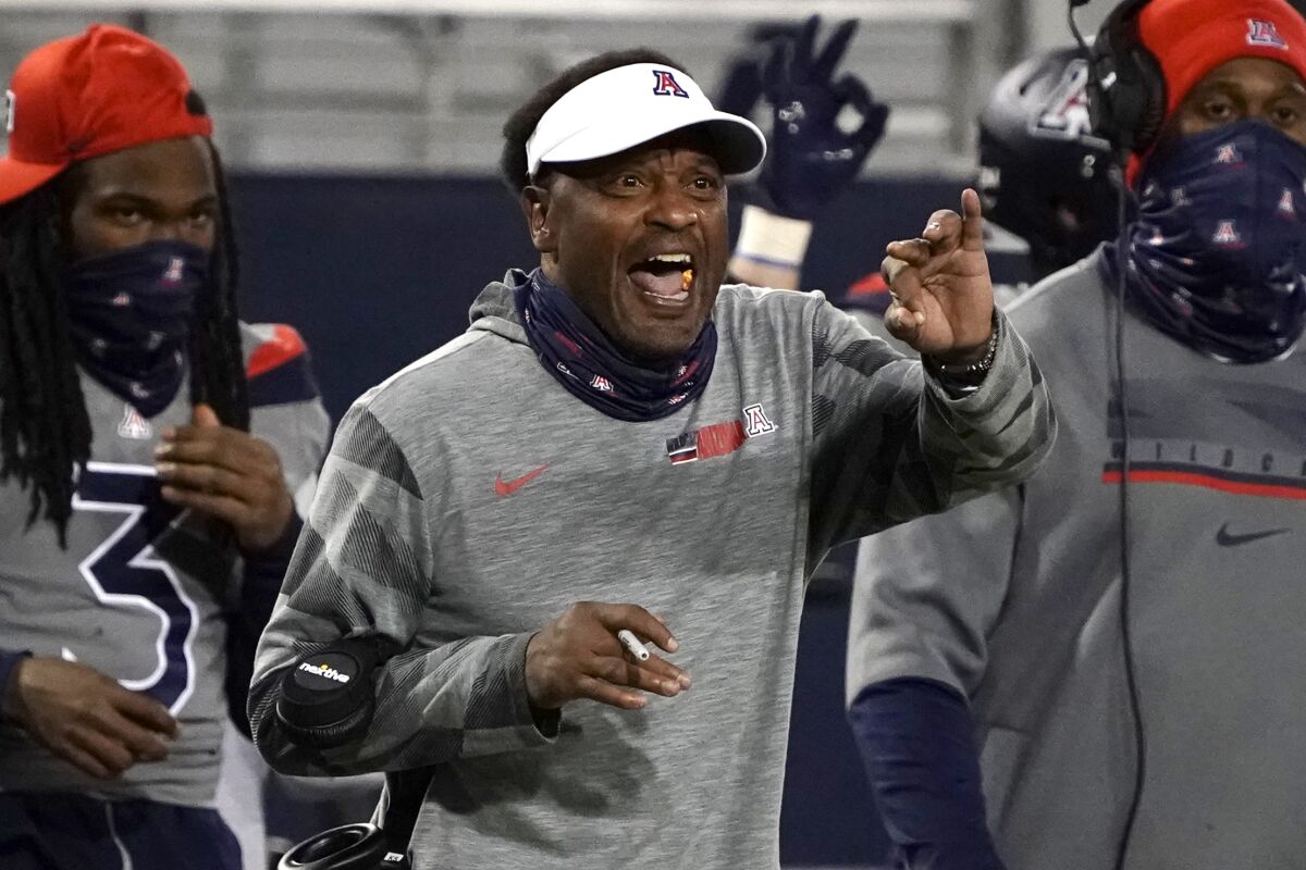 FILE - In this Saturday, Dec. 5, 2020, file photo, Arizona head coach Kevin Sumlin reacts to a call in the second half of an NCAA college football game against Colorado,, in Tucson, Ariz. Sumlin was fired Saturday, Dec. 12, 2020, less than 24 hours after a 70-7 loss to Arizona State that stretched the Wildcats' losing streak to 12 games spanning two seasons. (AP Photo/Rick Scuteri, File)