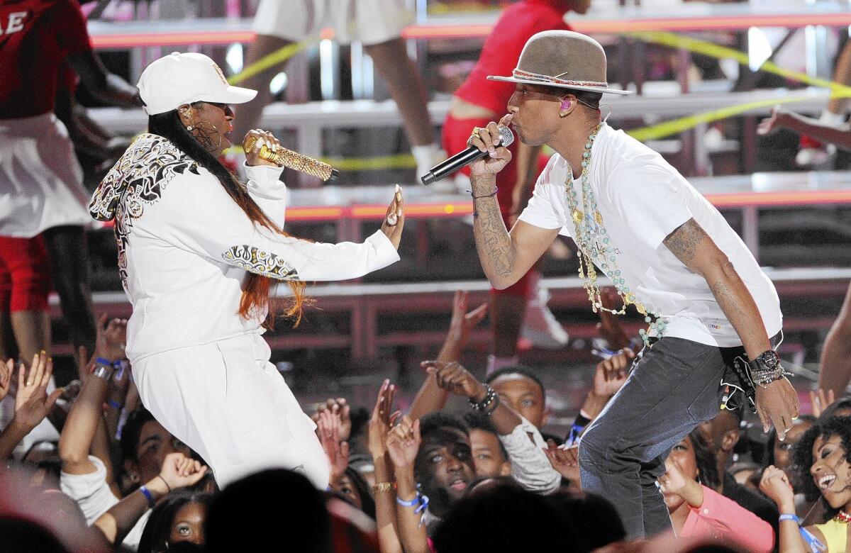 Missy Elliott, left, and Pharrell Williams perform at the BET Awards at Nokia Theatre on June 29, 2014, in Los Angeles.