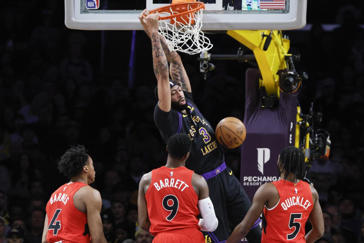 Anthony Davis scores 41 points as Lakers hold off Toronto - Los