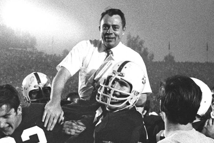 Stanford coach John Ralston is carried off the field by his players after they defeated Ohio State in the Rose Bowl on Jan. 1, 1971.