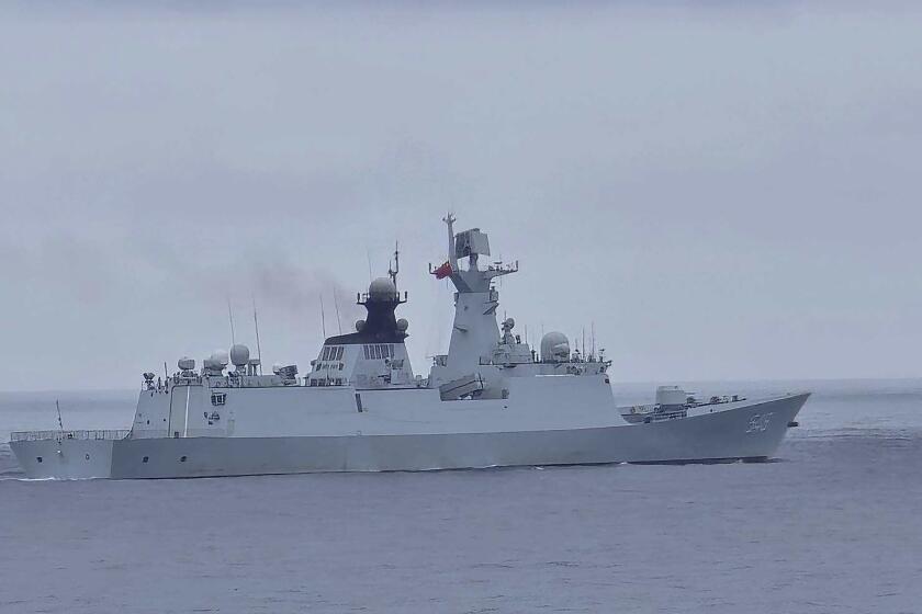 In this photo released by the Taiwan Coast Guard, a Chinese navy vessel identified as the Chinese Missile Frigate FFG 548 is seen near the Pengjia Islet north of Taiwan on Thursday, May 23, 2024. Taiwan scrambled jets and put missile, naval and land units on alert Thursday over Chinese military exercises being conducted around the self-governing island democracy where a new president took office this week. (Taiwan Coast Guard via AP)