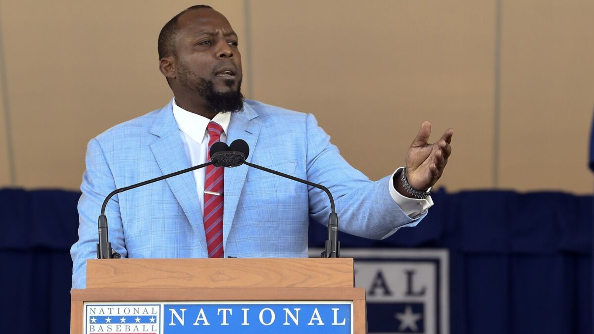 Vladimir Guerrero speaks during an induction ceremony at the Clark Sports Center on Sunday in Cooperstown, N.Y.