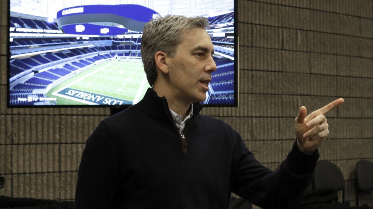 Rams chief operating officer Kevin Demoff answers questions at the media center for Super Bowl LIII in Atlanta.