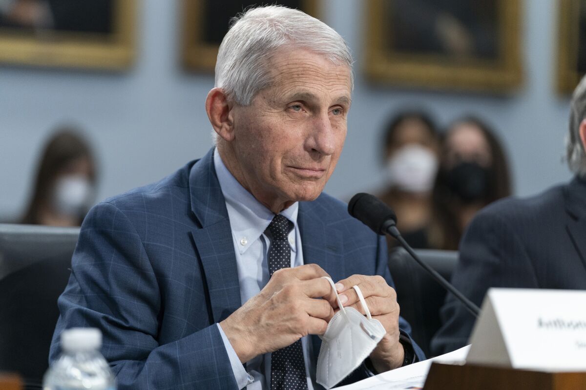 FILE - Dr. Anthony Fauci, director of the National Institute of Allergy and Infectious Diseases, testifies to a House Committee on Appropriations subcommittee on Labor, Health and Human Services, Education, and Related Agencies hearing, about the budget request for the National Institutes of Health, Wednesday, May 11, 2022, on Capitol Hill in Washington. A West Virginia man was sentenced Thursday, Aug. 4, 2022, to three years in federal prison after sending emails that threatened Fauci and other health officials for talking about the coronavirus and efforts to prevent it from spreading. (AP Photo/Jacquelyn Martin, File)