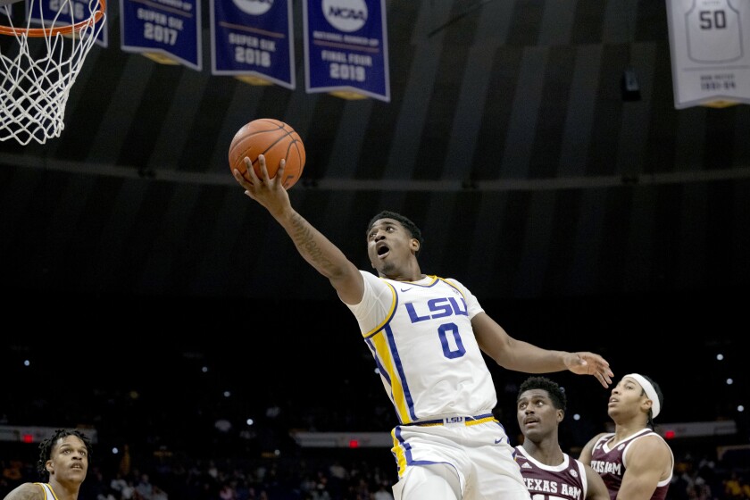 LSU guard Brandon Murray (0) shoots ahead of Texas A&M forward Henry Coleman III (15) during the first half of an NCAA college basketball game in Baton Rouge, La., Wednesday, Jan. 26, 2022. (AP Photo/Matthew Hinton)