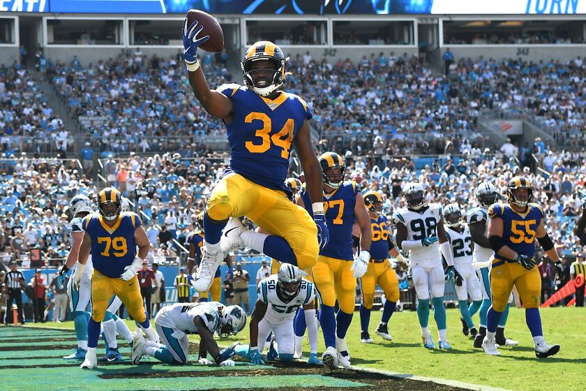 CHARLOTTE, NORTH CAROLINA SEPTEMBER 8, 2019-Rams running back Malcolm Brown celebrates his 2nd touchdown of the game against the Panthers in the 3rd quarter at Bank of America Stadium in Charlotte Sunday.(Wally Skalij/Los Angeles Times)