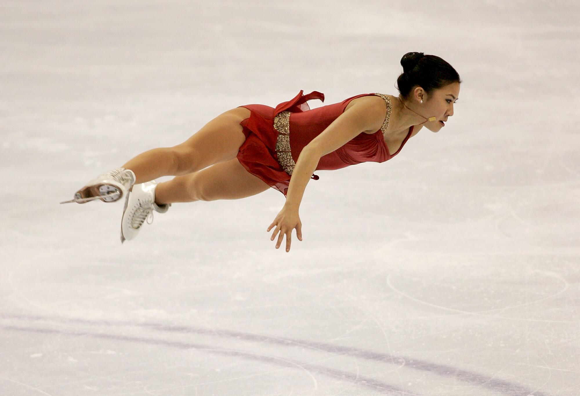 Michelle Kwan competing in the women's short program during the 1995 U.S. Figure Skating Championships in Portland, Ore. Kwan finished her career with nine U.S. titles.