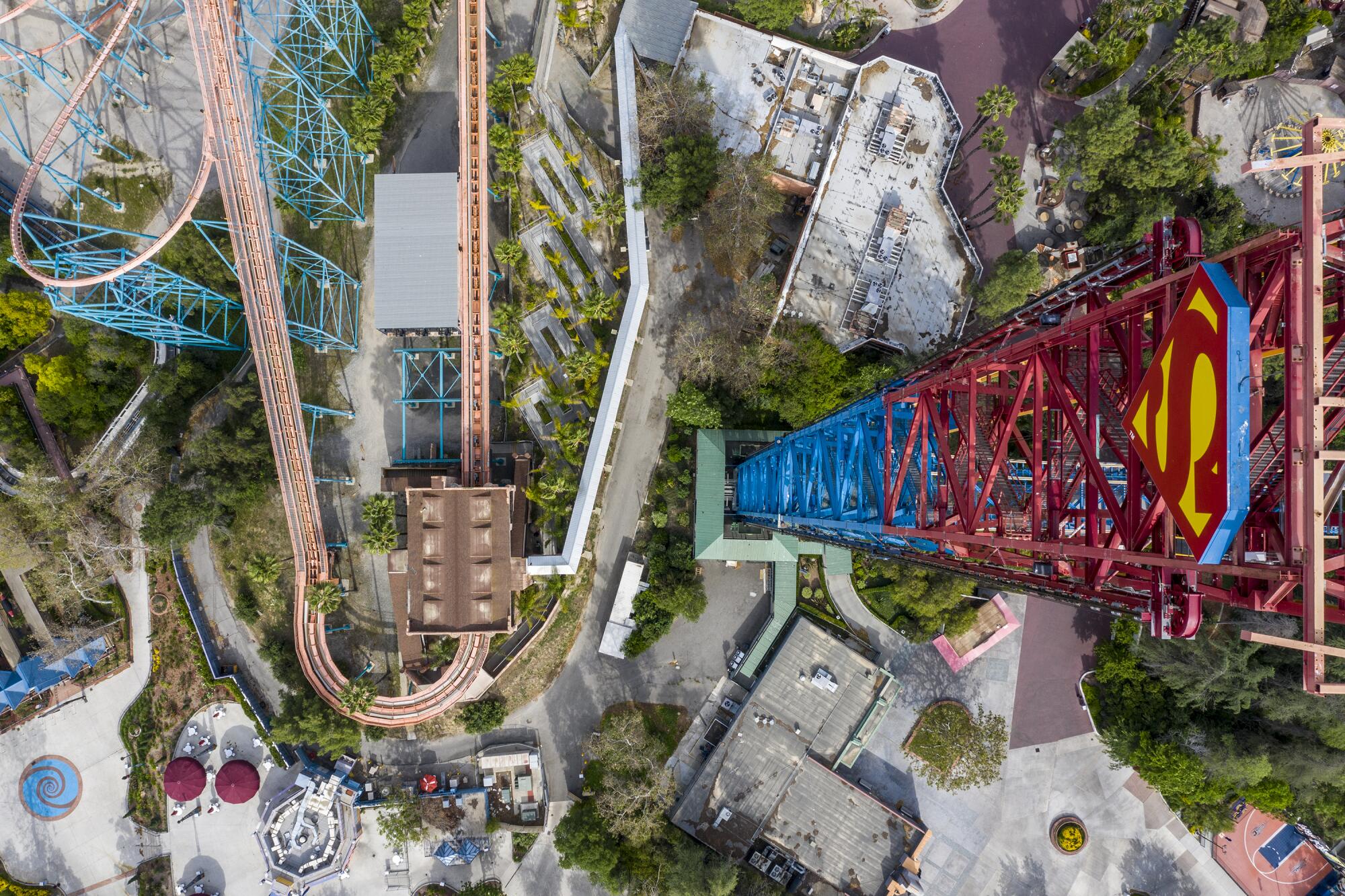 Superman towers over the Goliath roller coaster at Six Flags.