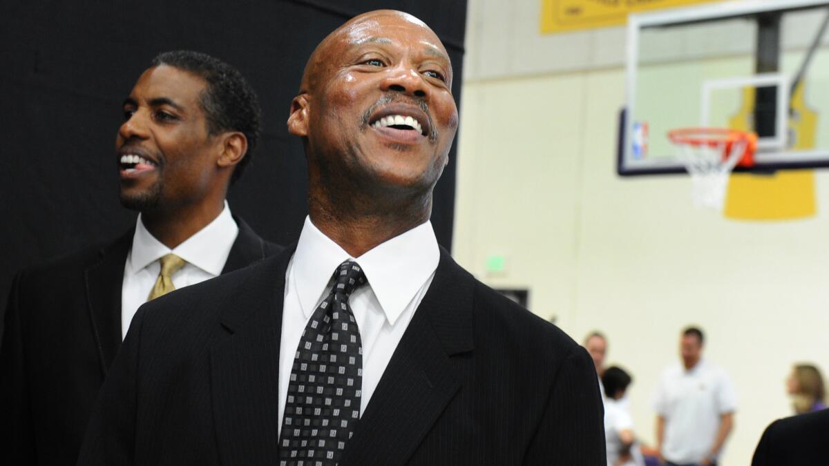 Lakers Coach Byron Scott smiles while attending the team's media day in El Segundo on Sept. 29.