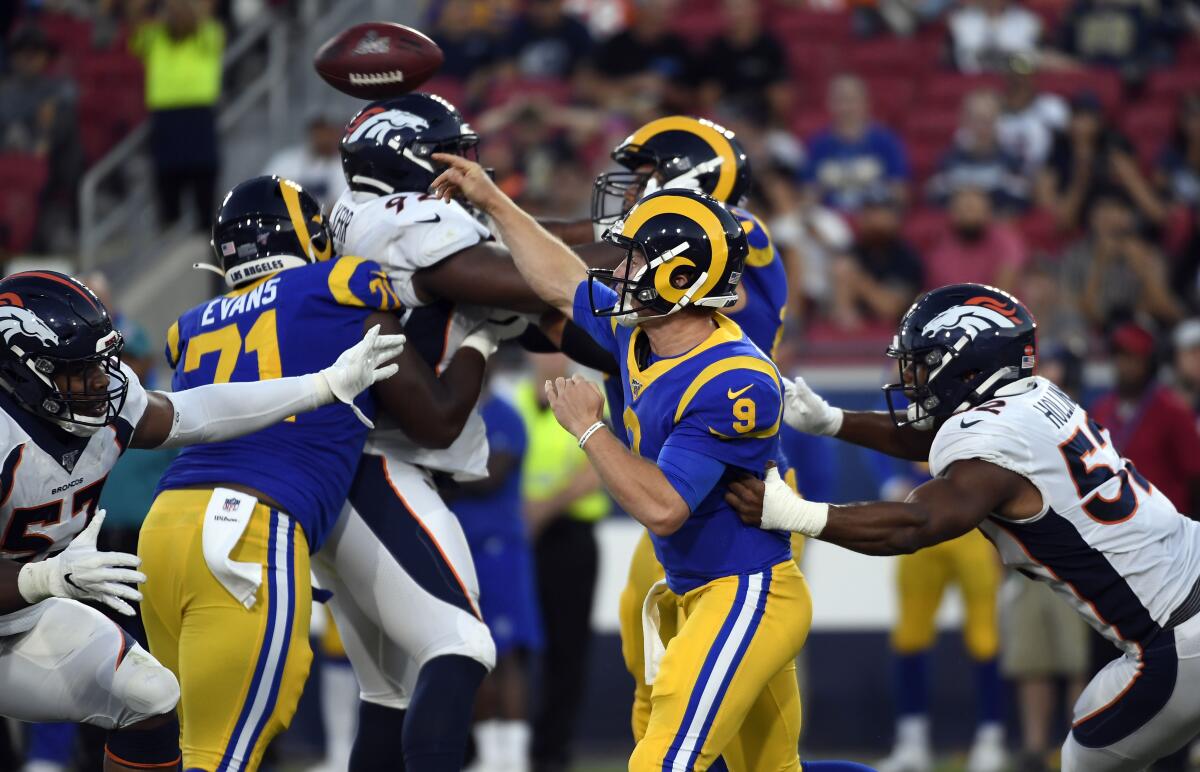 Rams quarterback John Wolford throws a pass during the team's 10-6 preseason victory over the Denver Broncos on Saturday.
