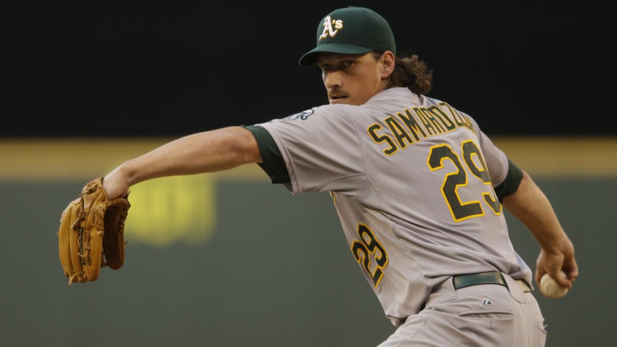 Oakland Athletics starting Jeff Samardzija delivers a pitch during Friday's game against the Seattle Mariners.