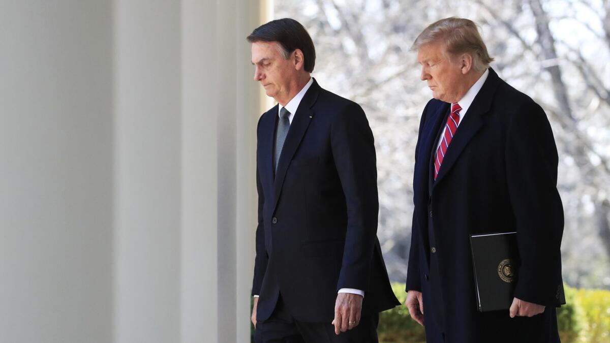 President Trump with visiting Brazilian President Jair Bolsonaro, left, at the White House on March 19, 2019.