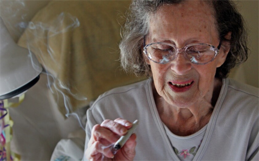 RELIEF: Betty Hiatt, 81, smokes medicinal marijuana at her Seattle home. Having survived cancer, Crohn's disease and the onset of Parkinson's disease, the grandmother said a few puffs each morning help quell the nausea caused by her multiple prescription drugs.