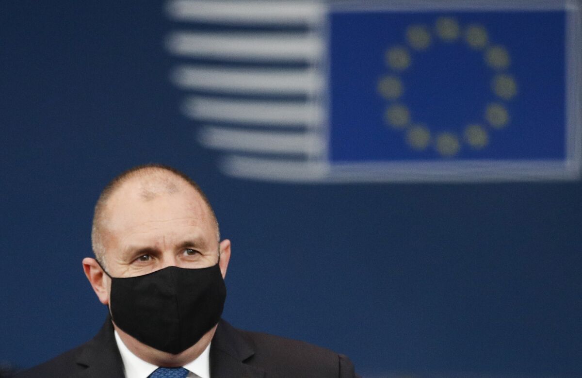 Bulgaria's President Rumen Radev arrives for an EU Summit at the European Council building in Brussels, Thursday, Dec. 16, 2021. European Union leaders meet for a one-day summit Thursday that will center on Russia's military threat to neighbouring Ukraine and on ways to deal with the continuing COVID-19 crisis. (Johanna Geron, Pool Photo via AP)
