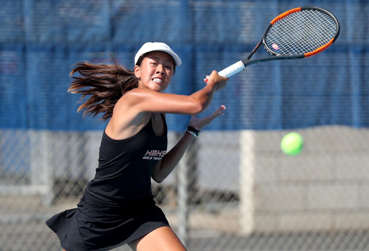 Huntington Beach's Yen-Nhi Huynh competes in a No. 1 singles set against Villa Park in a nonleague match on Sept. 2.