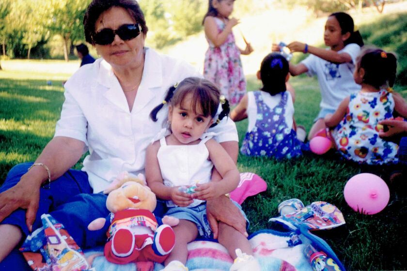 Rosa Cardenas and her granddaughter, Ilianna Salas, at a family party.