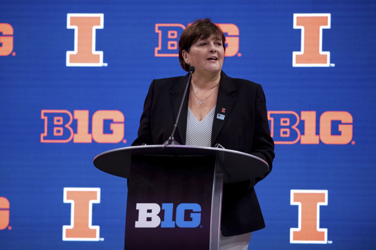 FILE - Illinois women's head coach Nancy Fahey addresses the media during the first day of the Big Ten NCAA college basketball media days, Thursday, Oct. 7, 2021, in Indianapolis. Nancy Fahey, who won five national championships at the Division III level, is retiring from coaching after never posting a winning record in five seasons at Illinois. Fahey's announcement Friday, March 4, 2022, came a day after the Illini finished a 7-20 season with a loss to Nebraska in the Big Ten women's tournament. (AP Photo/Doug McSchooler, File)