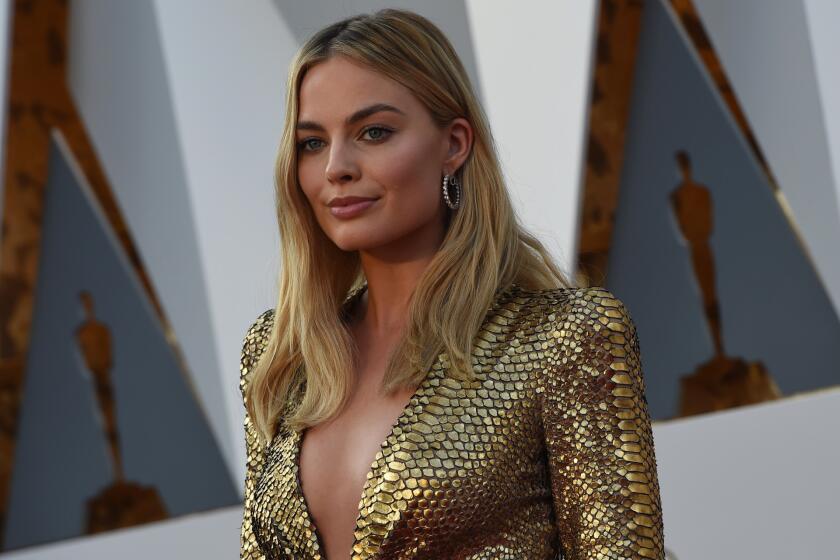 Margot Robbie arrives on the red carpet at last month's Academy Awards. Robbie has signed on to play Tonya Harding in biopic "I, Tonya."