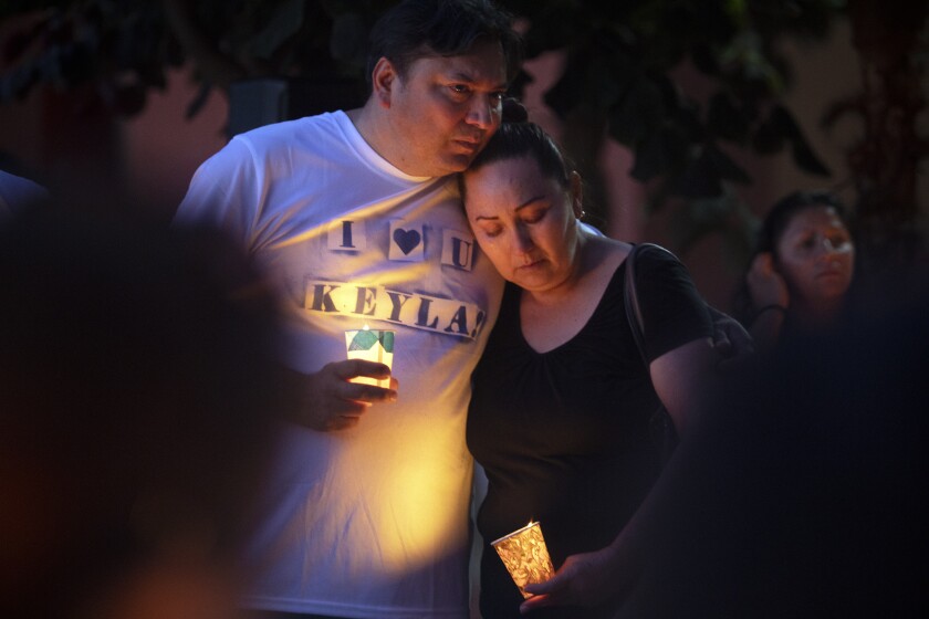 Family and friends gather to participate in a vigil honoring Keyla Salazar, a 13-year-old girl killed in the Gilroy Garlic Festival shooting in Northern California on July 28.